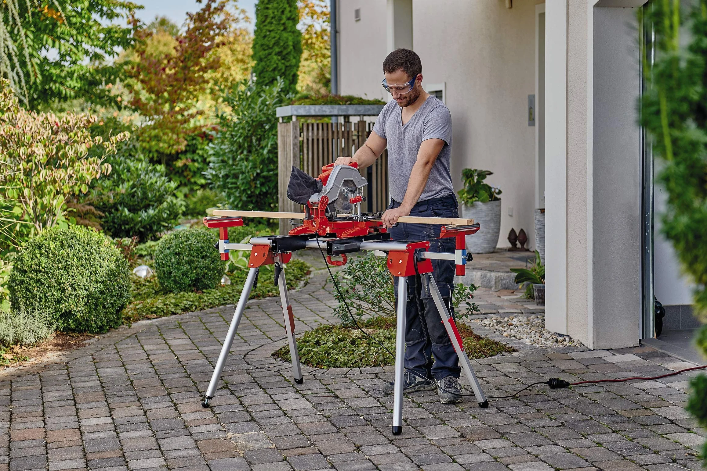 Originale Einhell MSS 1610 Banchetto universale estensibile per troncatrici (in alluminio, alt. 85 cm, lungh. Max 161 cm, max 100 kg, vano porta utensili, regolaz. piedini, rulli di scorrimento)