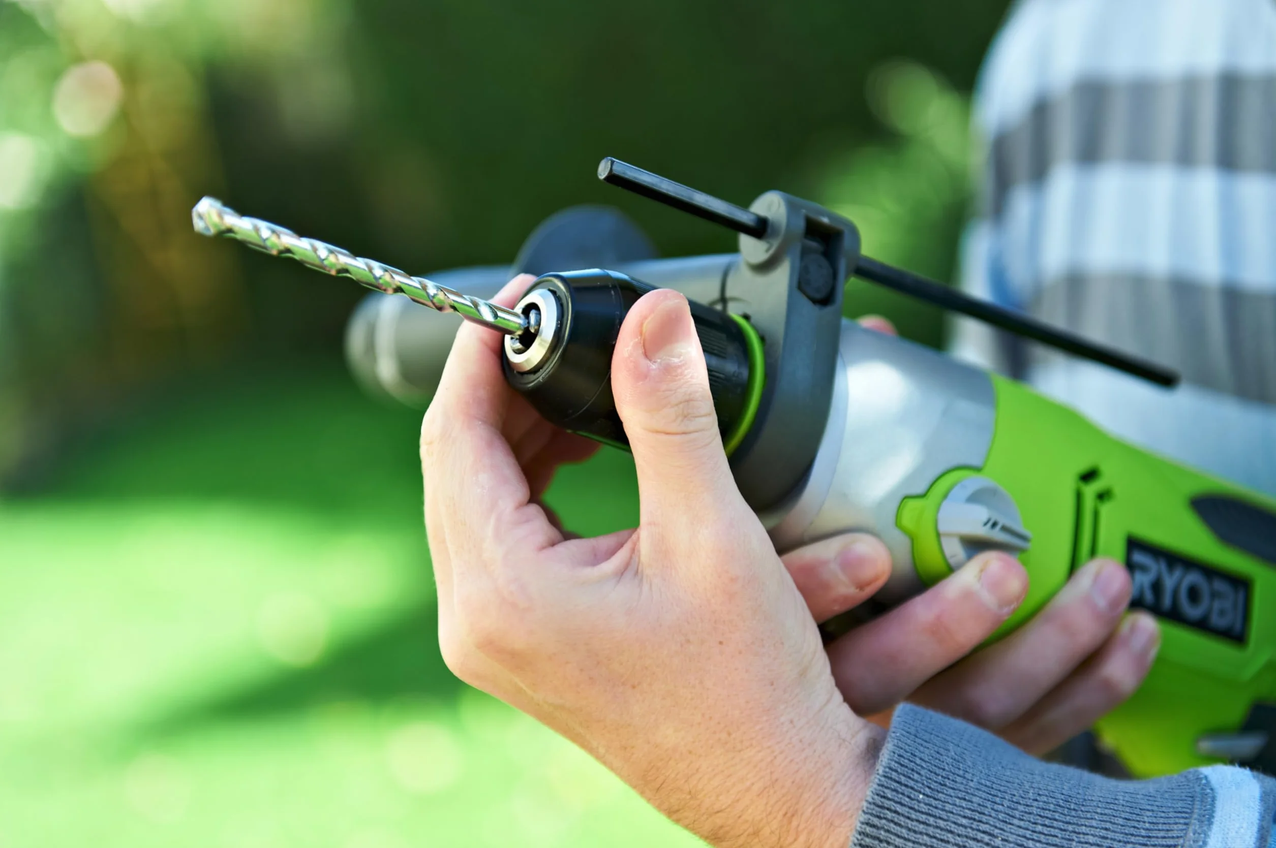 Ryobi Trapano a Percussione Elettrico 1200W, Mandrino Autoserrante 13 mm, 2 Velocità, Reversibile, per Legno Metallo e Muratura, Impugnatura Ausiliaria, Luce LED, Asta di Profondità, RPD1200-K