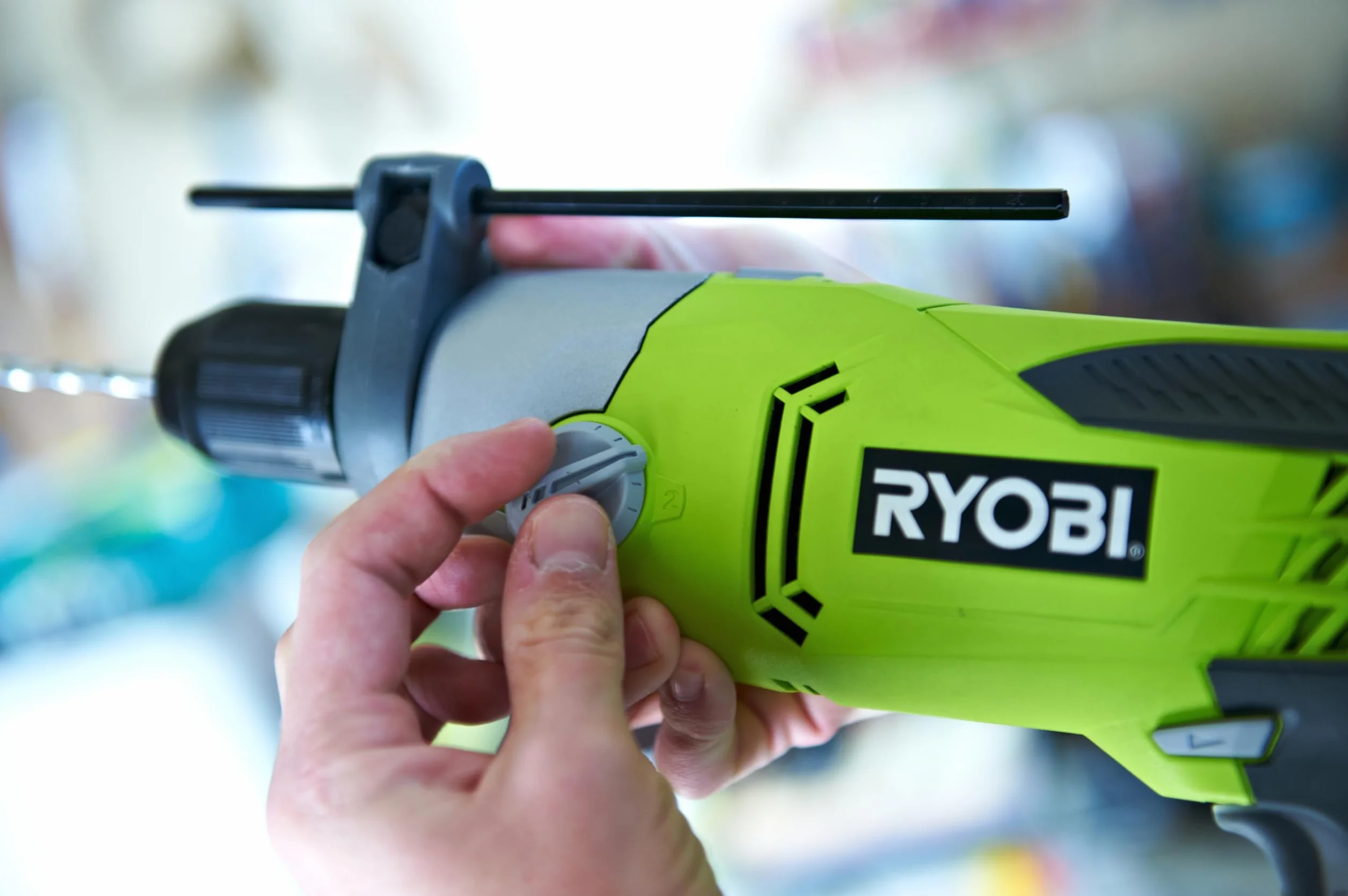 Ryobi Trapano a Percussione Elettrico 1200W, Mandrino Autoserrante 13 mm, 2 Velocità, Reversibile, per Legno Metallo e Muratura, Impugnatura Ausiliaria, Luce LED, Asta di Profondità, RPD1200-K