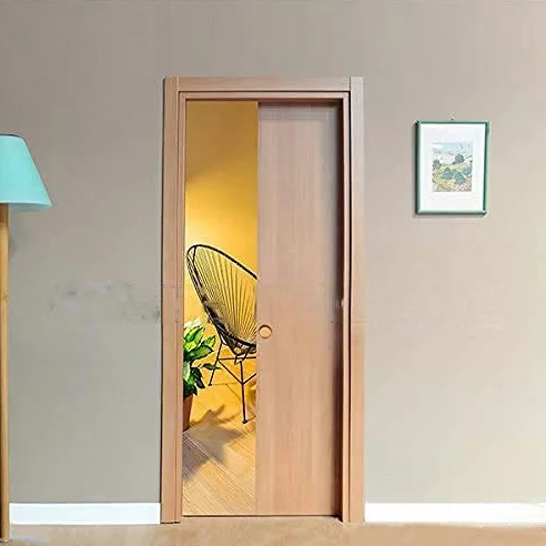 Porta scorrevole a scomparsa per cartongesso in laminato Noce Tanganica Naturale Finitura Ottone